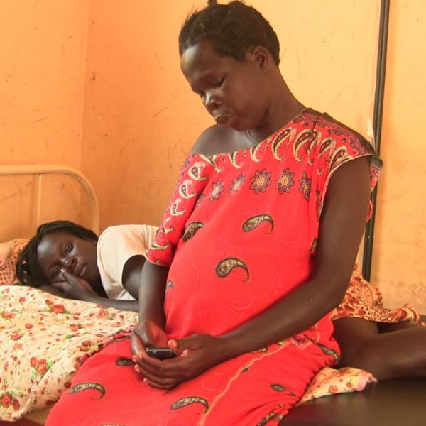 A mother with her daughter admitted at Kitamiiro Health Centre IV in Buvuna District