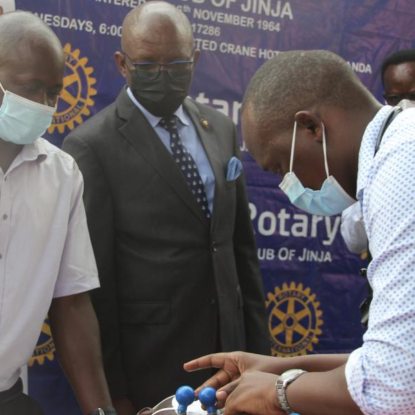 Jinja regional referral hospital’s resident cardiologist, Dr. Asad Muyinda demonstrates how the machine operates.