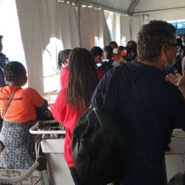 UAE Bound passengers wait for their results at Safari Lab, Peniel beach near Entebbe airport