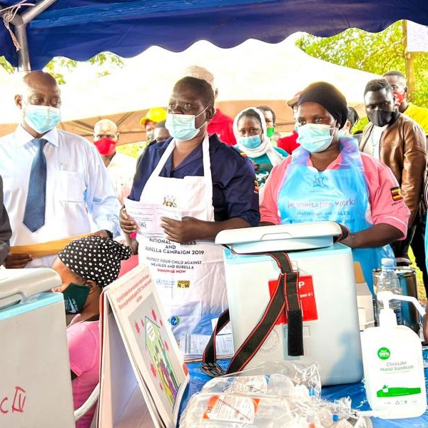 Ministry of Health permanent secretary, Dr. Diana Atwine along side health workers during the launch of accelerated covid-19 vaccination in Kalangal