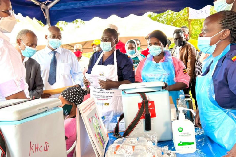 Ministry of Health permanent secretary, Dr. Diana Atwine along side health workers during the launch of accelerated covid-19 vaccination in Kalangal