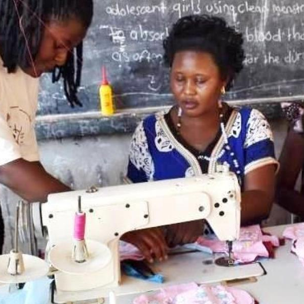 Women sewing reusable sanitary pads during the training